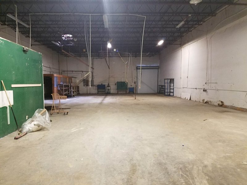 Large warehouse interior with the floor cleared