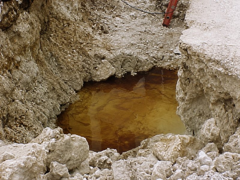 Excavation pit with groundwater at the bottom