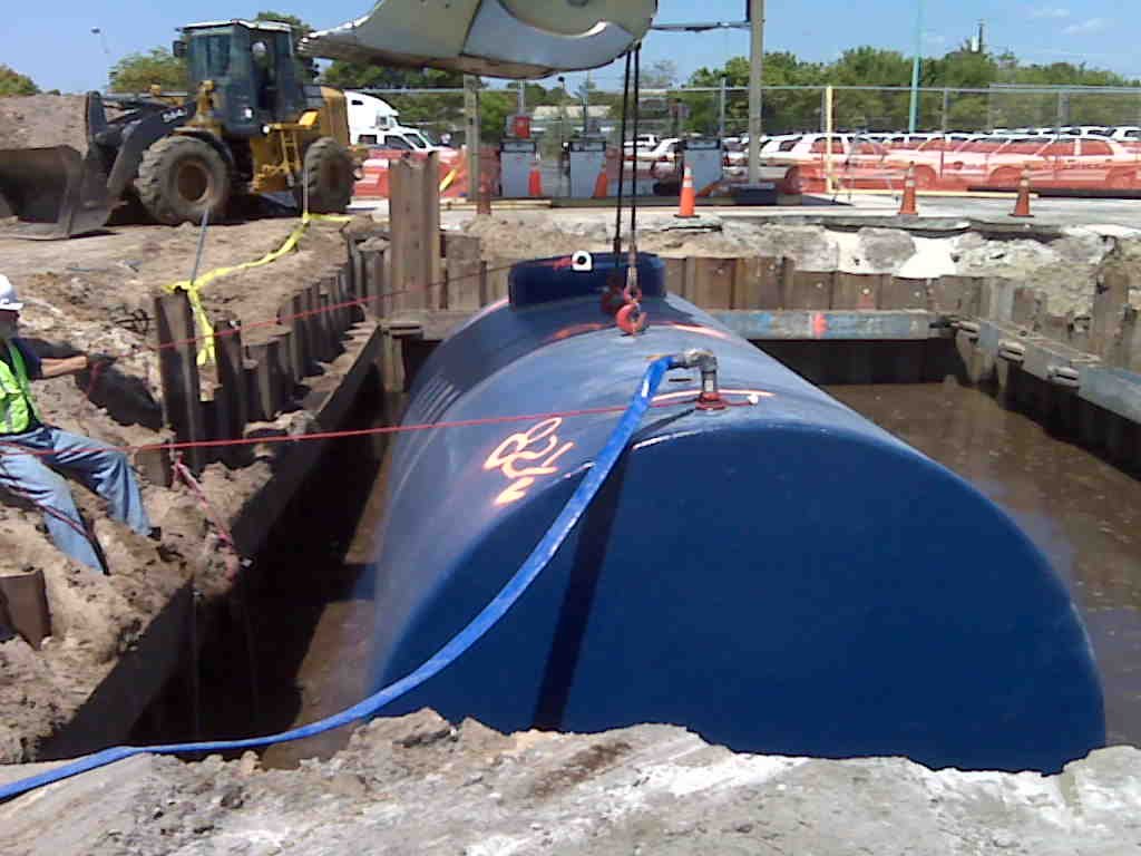 Dual-compartment tank being installed